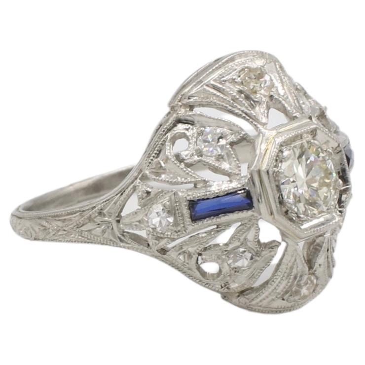Art Deco Platinum Old European Cut Natural Diamond & Sapphire Filigree Cocktail Ring 
Metal: Platinum
Weight: 3.87 grams
Diamonds: Approx. 0.75 CTW old European & single cut natural diamonds I-J SI. Center stone is approx. 1/3 carat. 
Top: 16 x