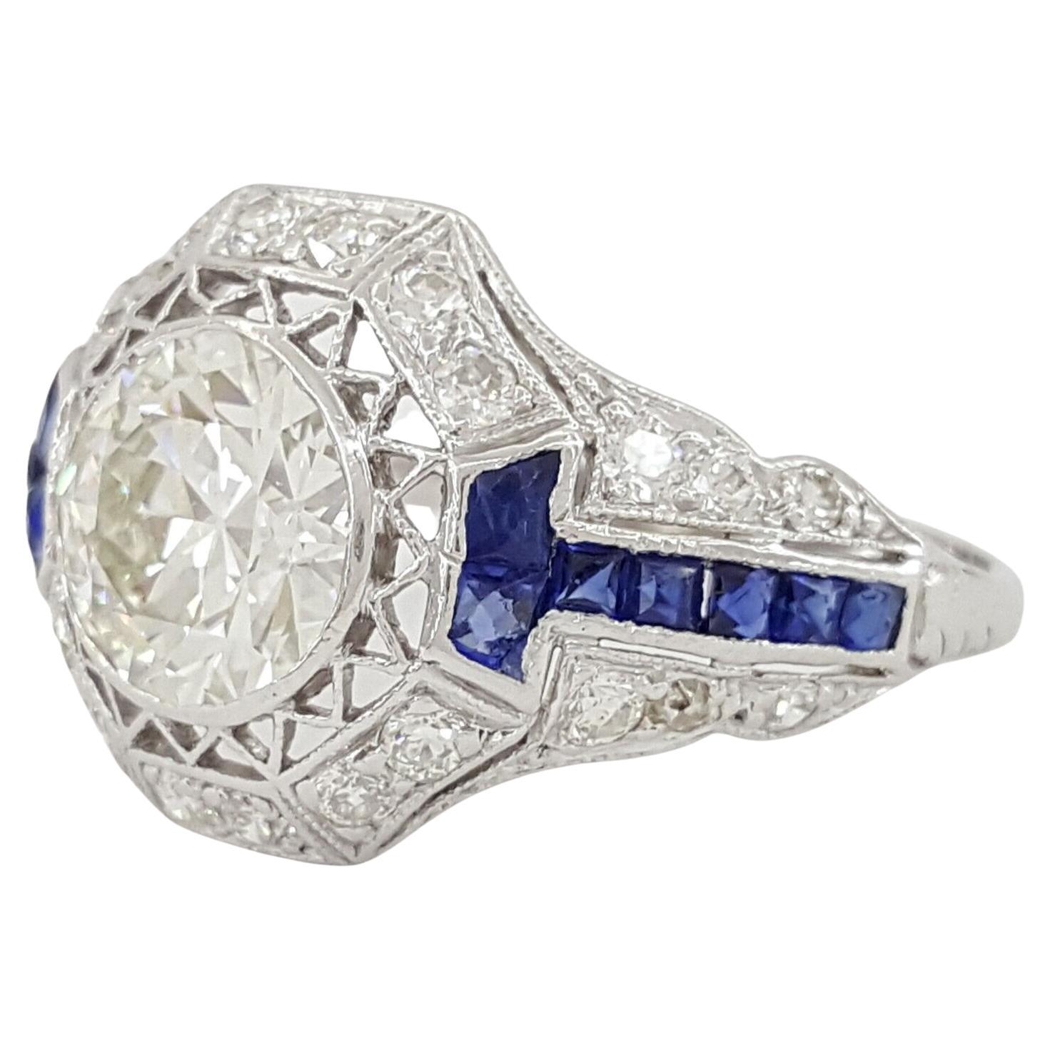 Art Deco Platinum Old European Round Brilliant Cut Diamond & Sapphire Ring In Excellent Condition For Sale In Rome, IT