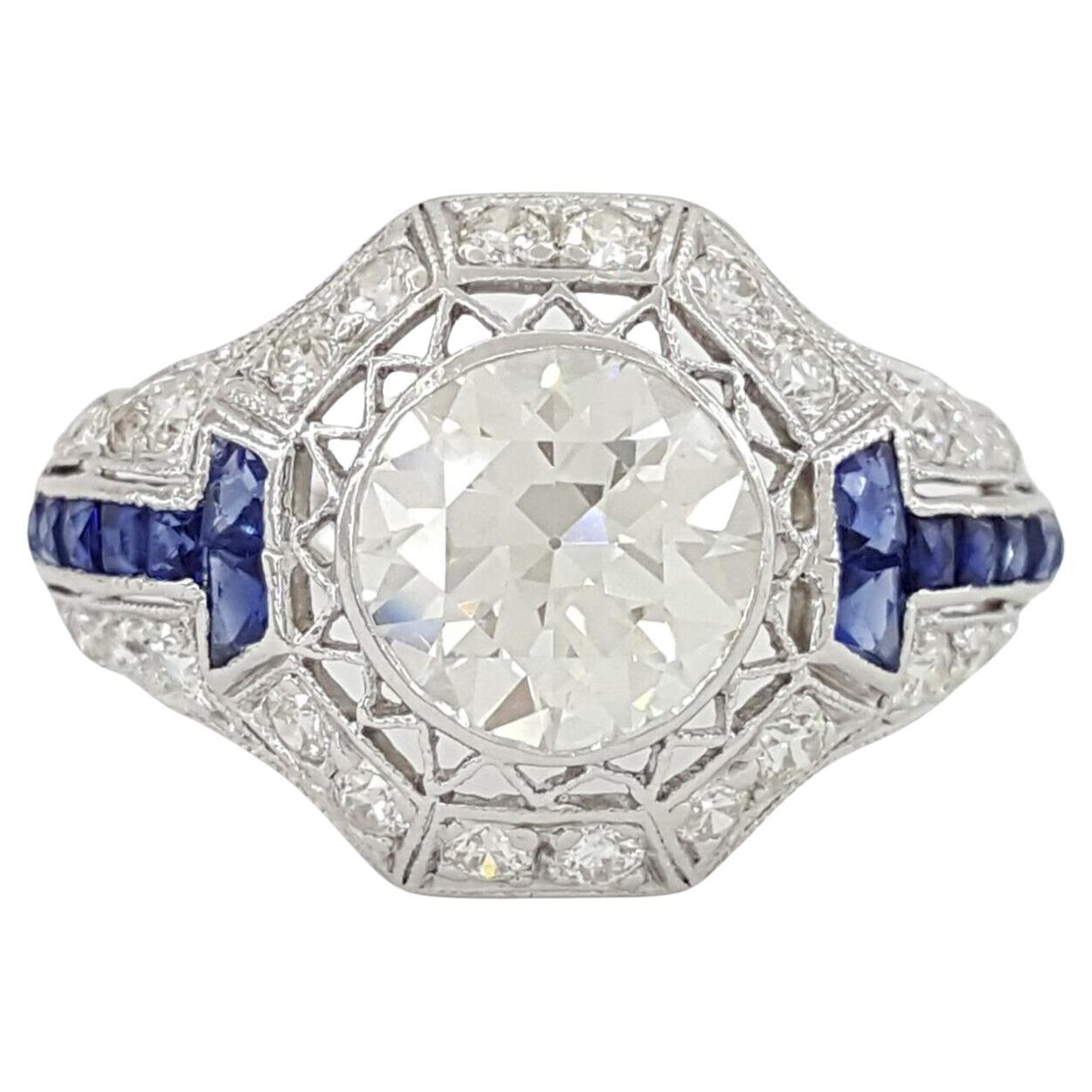Art Deco Platinum Old European Round Brilliant Cut Diamond & Sapphire Ring For Sale