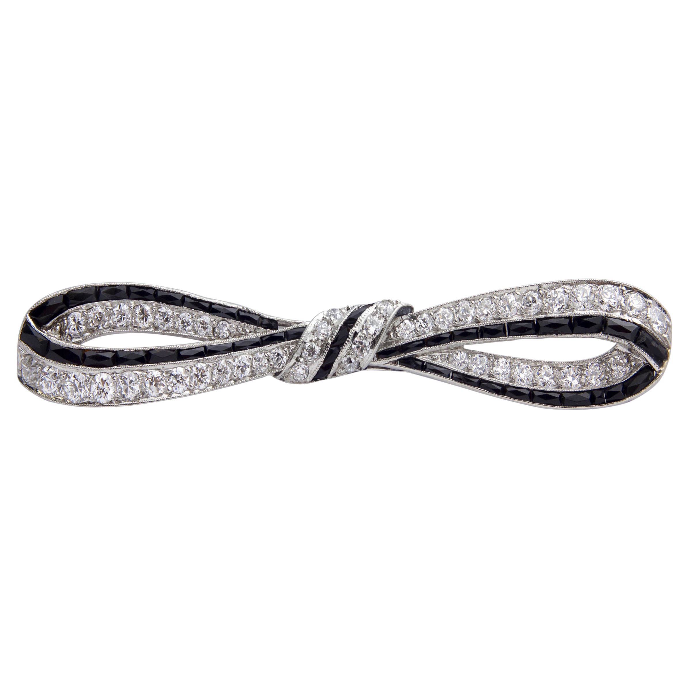 Art Deco, Platinum, Onyx
Diamond Bow Brooch