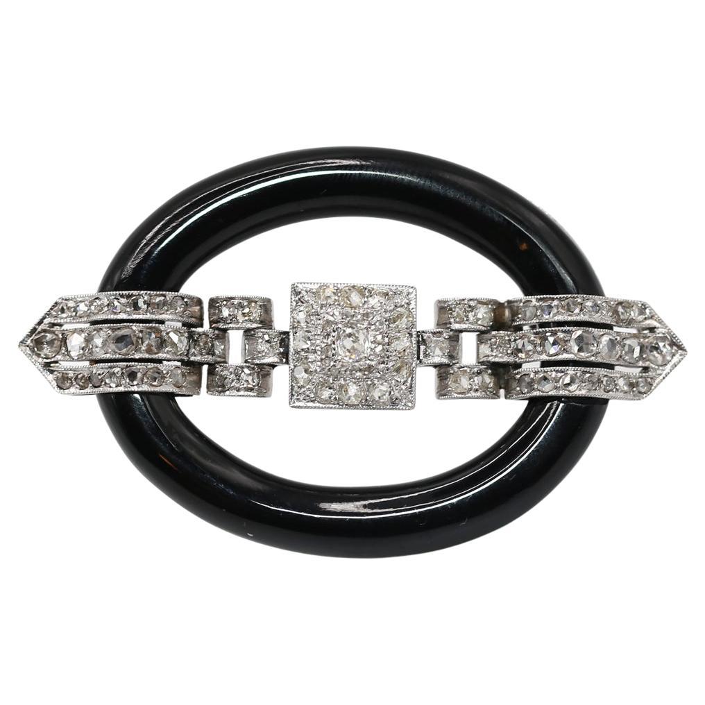 Art Deco Platinum Onyx Diamonds Buckle Brooch, 1910