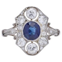 Art Deco Platinum oval cut 0.75 cts. sapphire and diamond cluster ring