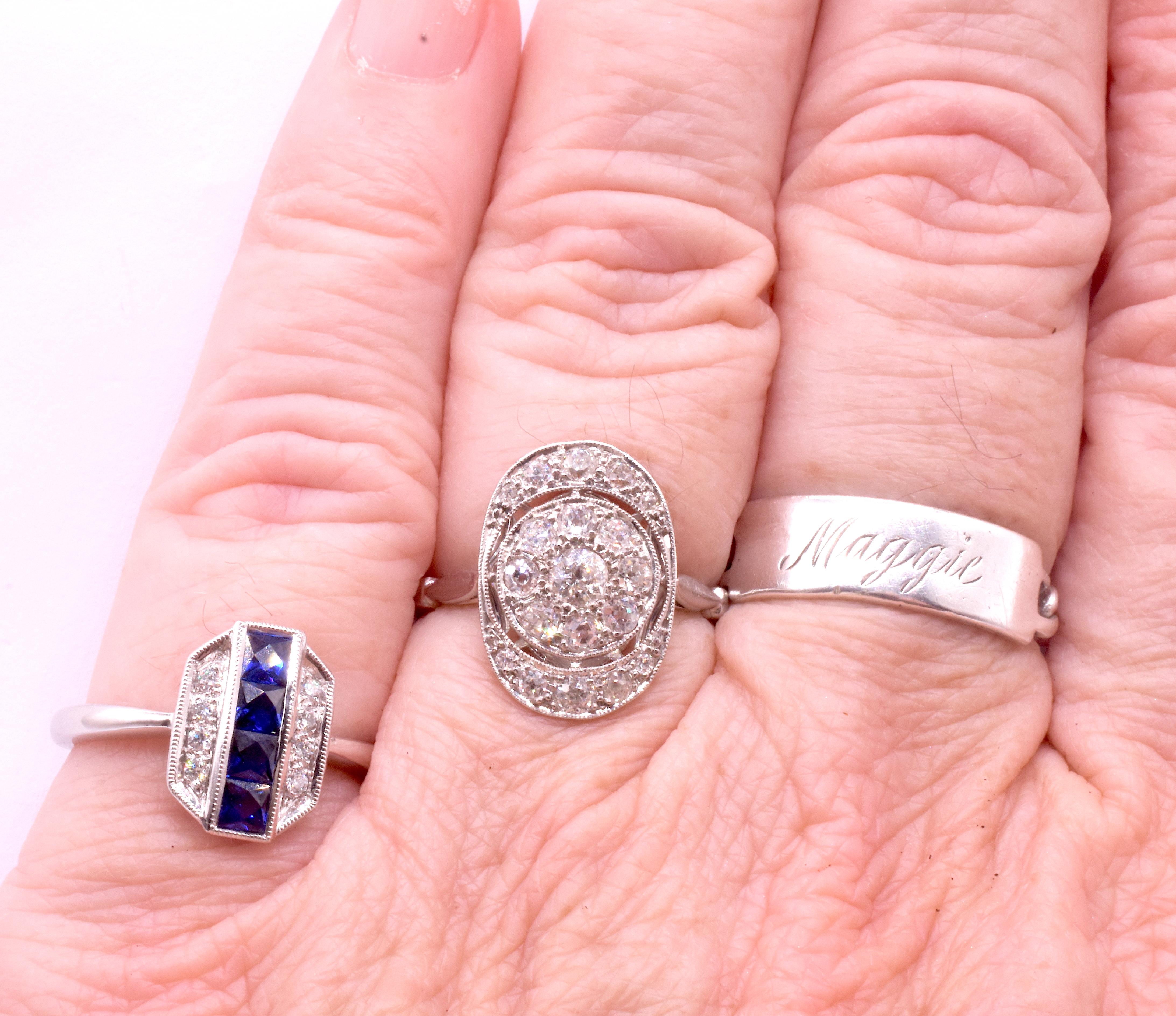 Anello Art Deco in platino con diamante ovale a grappolo e lavorazione aperta sulla corona in vendita 8