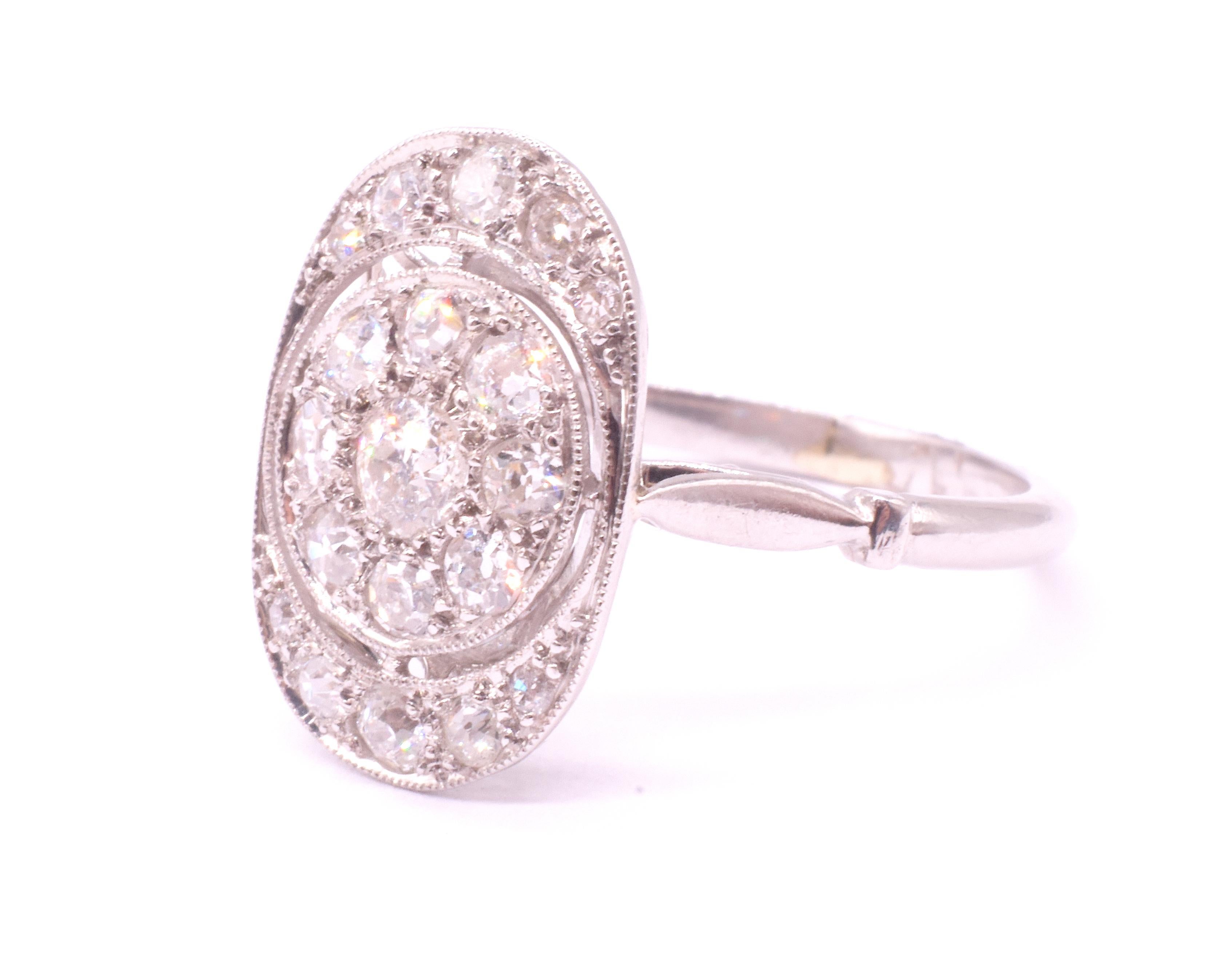 da uomo o donna Anello Art Deco in platino con diamante ovale a grappolo e lavorazione aperta sulla corona in vendita