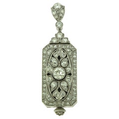 Art Deco Platinum Pendant/ Watch with Diamonds by J.E. Caldwell