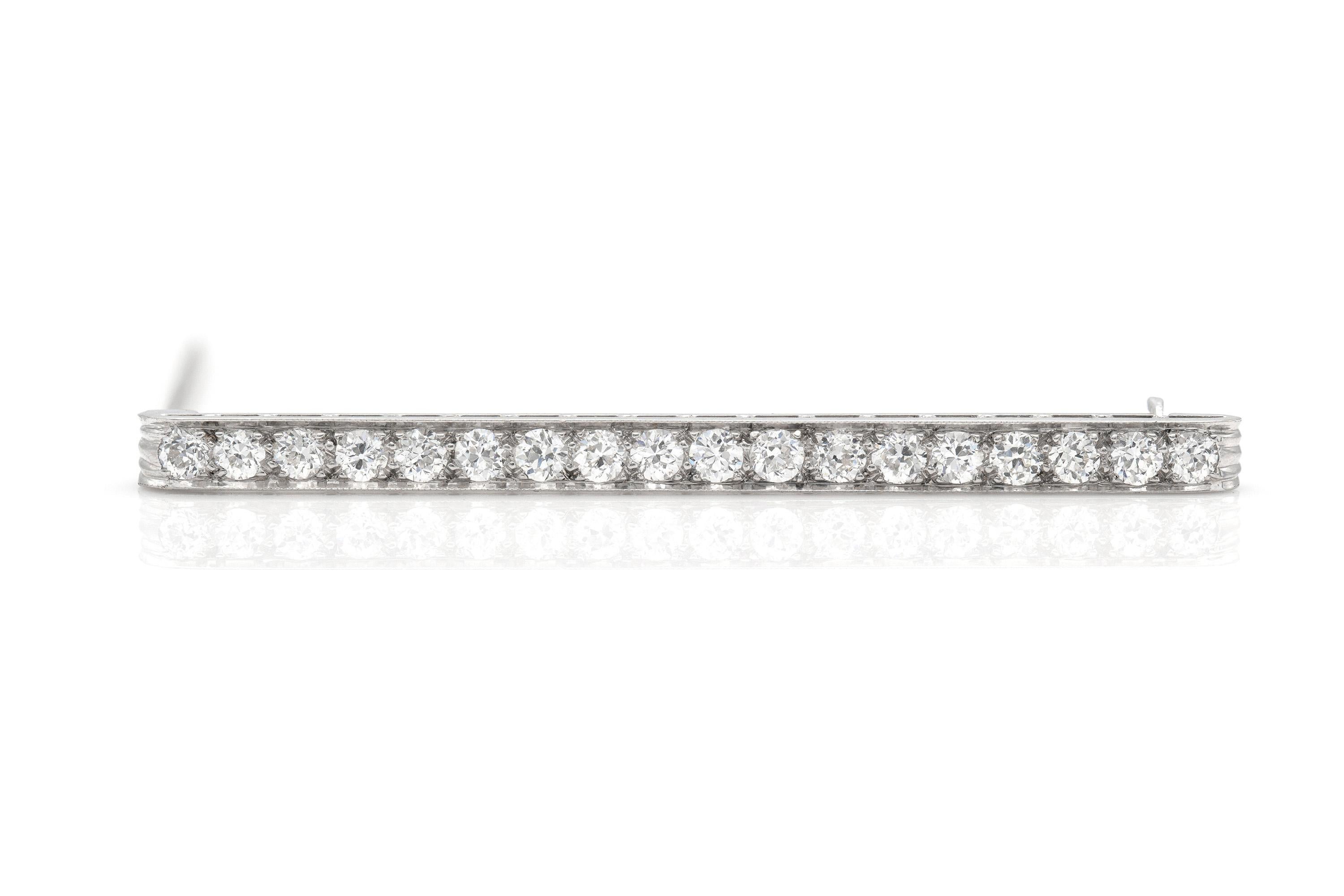 Finely crafted Art Deco Style Platinum pin with round-cut diamonds weighing approximately 2.00 carats. 