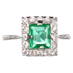 Art Deco Platinum Rectangular Emerald and Diamond Cluster Ring