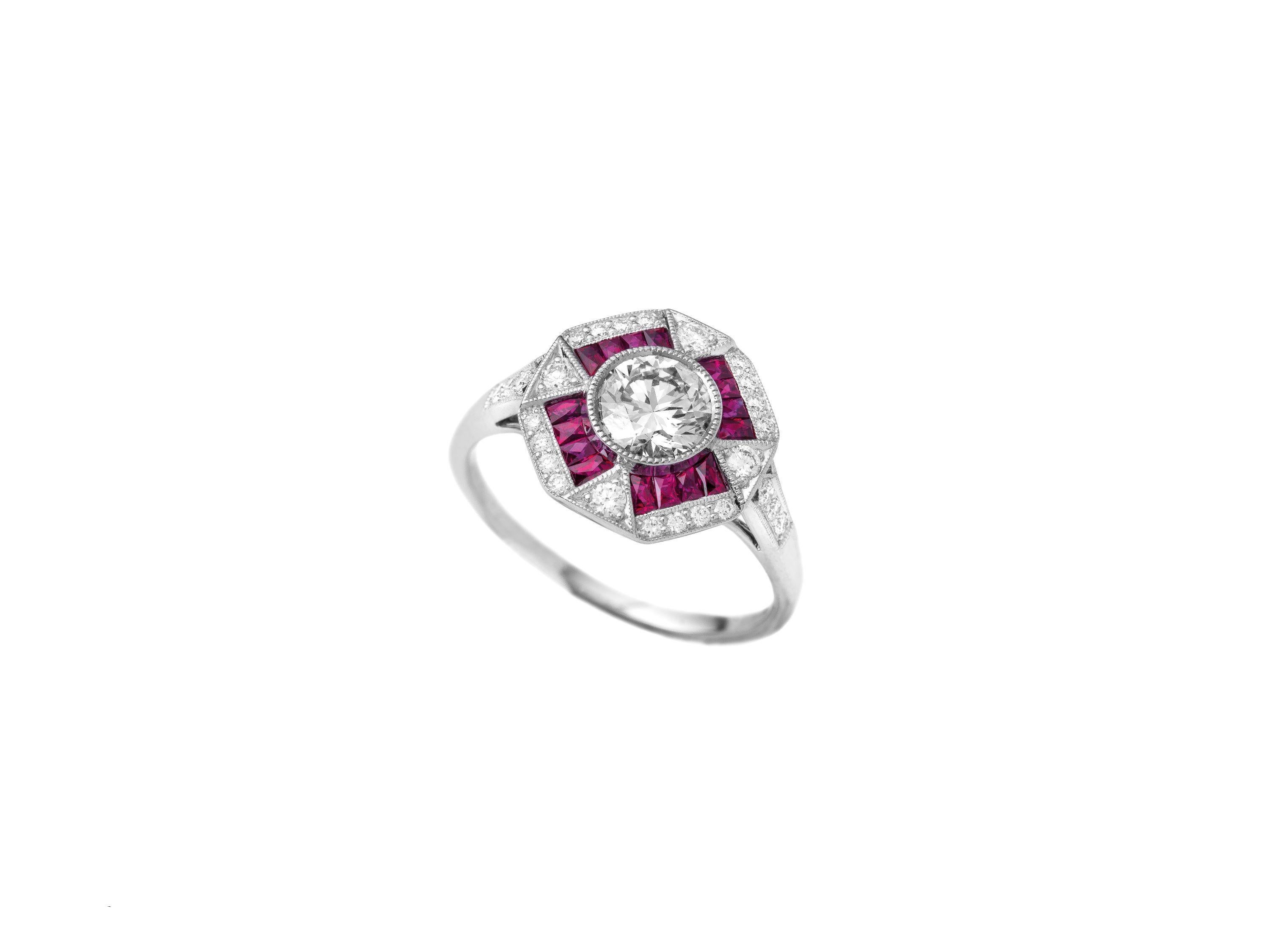 Art Deco Style Platinum Ring

Unique Jenny Dee Art Deco Style platinum ring, with round brilliant 0.73 ct GIA certificate, color F, purity VS1, set with VVS White Diamonds melees 0.22ct. and Ruby baguettes 0.40 ct. 
This ring is the perfect cocktail