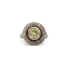 Anillo Art Déco de Platino con Diamante Amarillo GIA de 2,18ct y Rubíes Calibrados