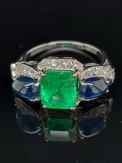 Art Deco Platinum Ring with 2.60ct Colombian Emerald, 2.5ct Sapphire, Diamonds