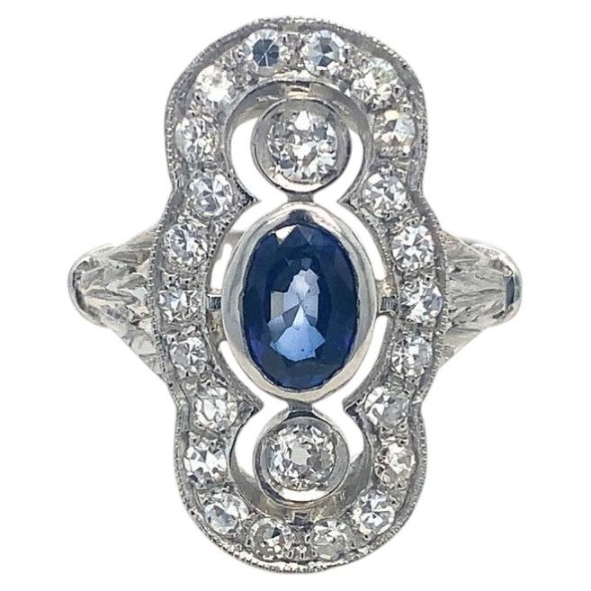 Art Deco platinum ring with a natural sapphire 0.70 ct and diamonds. For Sale