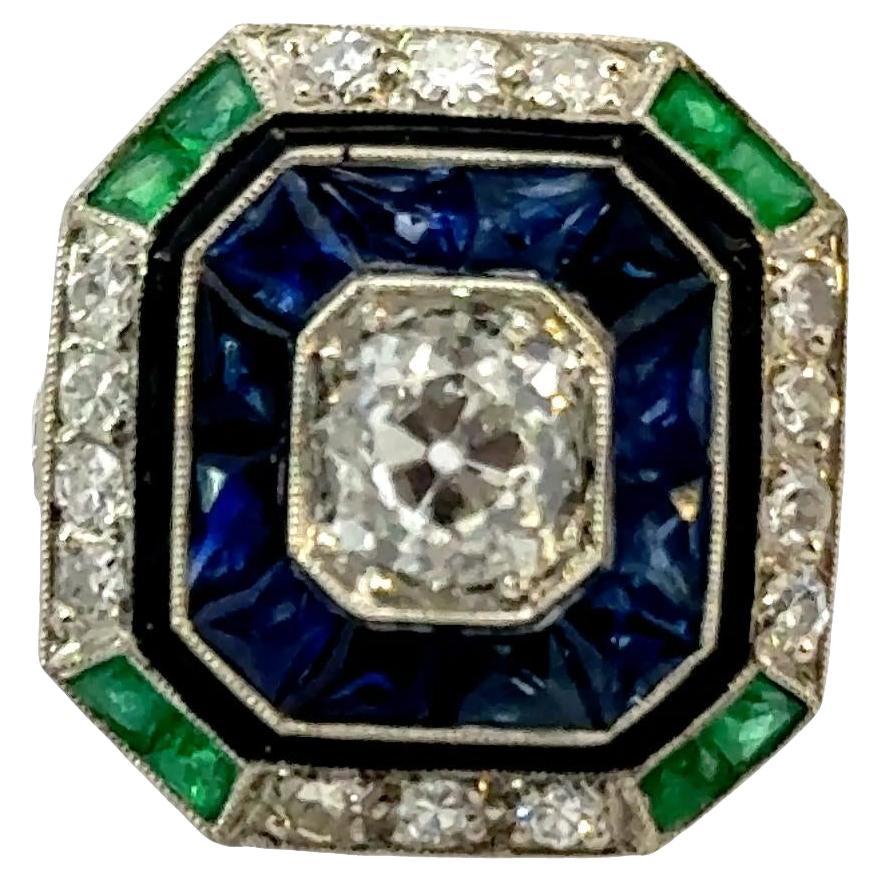 Anillo Art Decó de Platino con Diamantes, Zafiros, Esmeraldas y Esmalte Negro