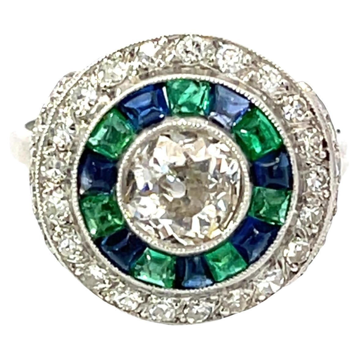 Anello Art Deco in platino con diamanti, zaffiri e smeraldi