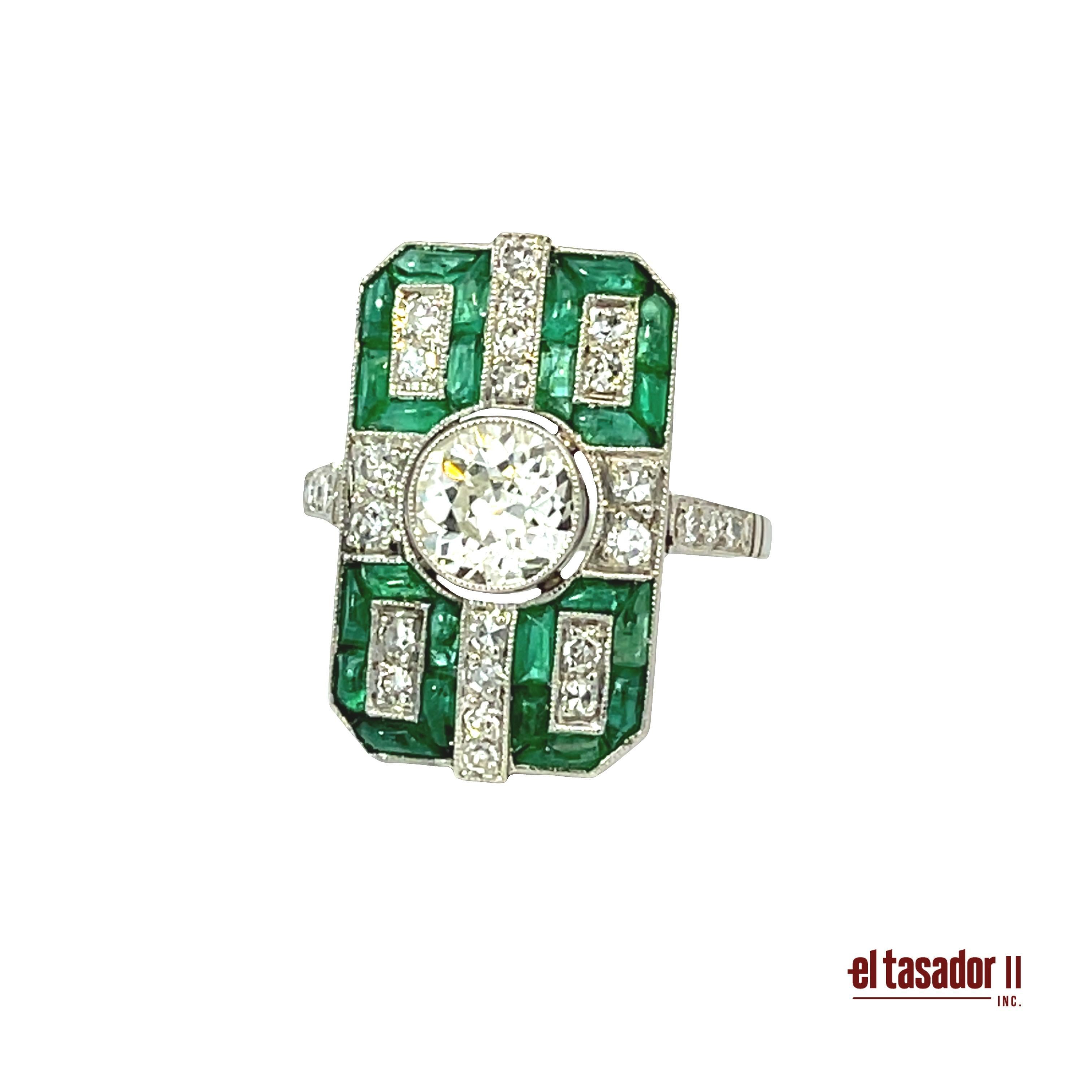 Une magnifique bague Art déco en platine, pesant 7,4 g, avec un design architectural saisissant qui combine géométrie et couleurs vives. En son centre se trouve un diamant taille brillant d'environ 0,91 ct, rehaussé par 0,43 ct de diamants brillants