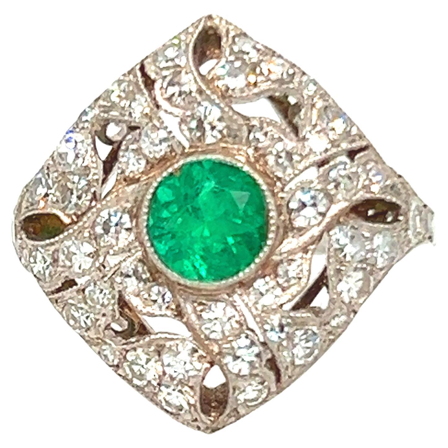 Art Deco Platinum Ring with Diamonds and Emerald For Sale