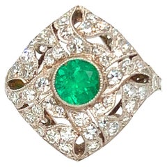 Art Deco Platinum Ring with Diamonds and Emerald