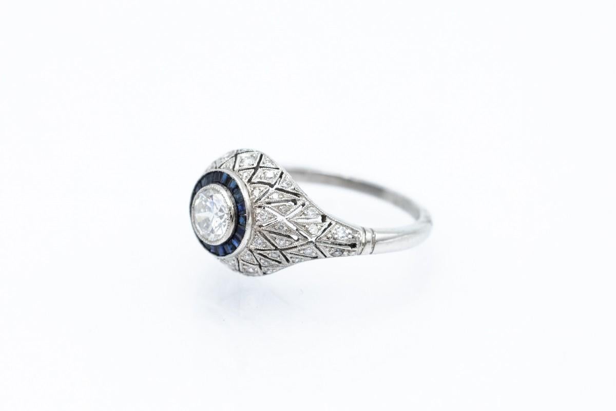 Women's or Men's Art Deco platinum ring with diamonds and sapphires. For Sale