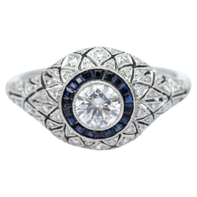 Art Deco platinum ring with diamonds and sapphires. For Sale