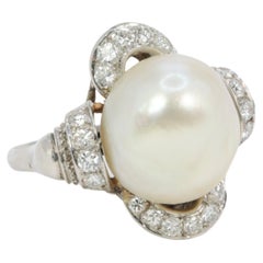 Antique Art-Deco platinum ring with natural pearl and diamonds