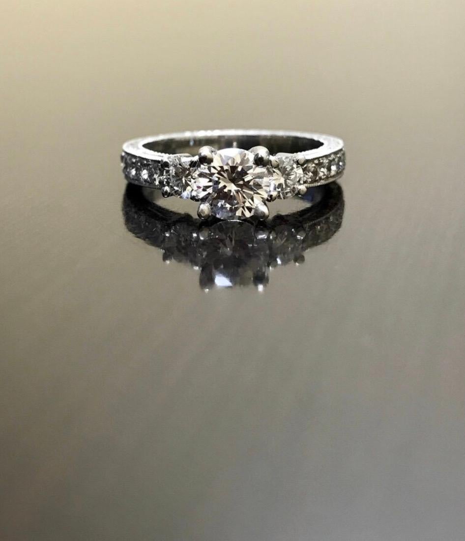 DeKara Designs Collection

Handmade Art Deco ring completely hand engraved made with 100% love, a true art piece!

Meta- 90% Percent Platinum, 10% Iridium

Stones- EGL USA Certified Round 0.73 Center Diamond D color VS1 clarity, 2 Prong Set Round