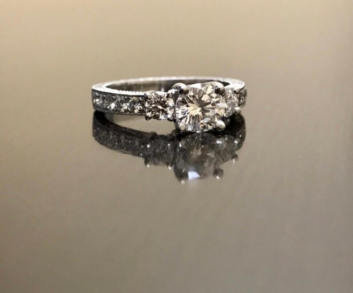 Art Deco Platinum Round D Color 0.73 Carat Three Stone Diamond Engagement Ring For Sale 1