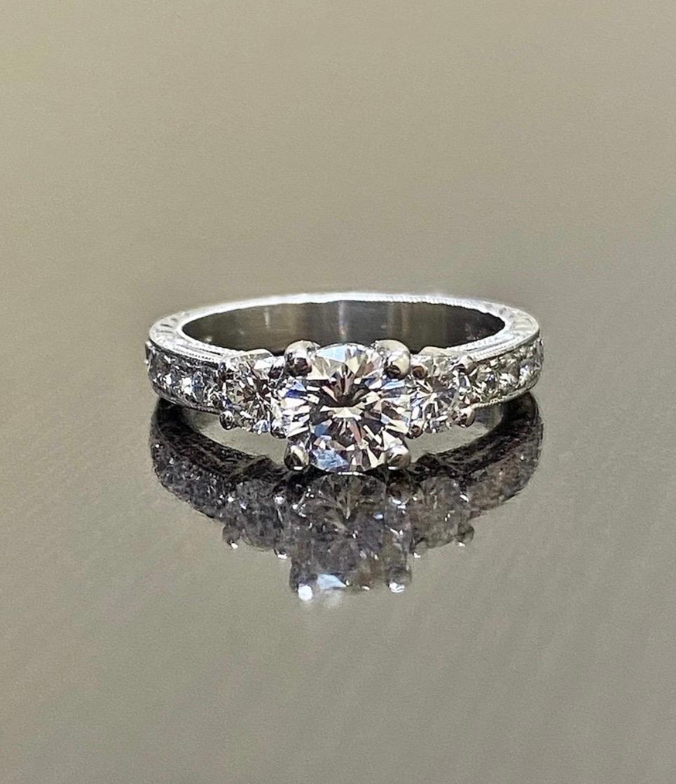 Art Deco Platinum Round D Color 0.73 Carat Three Stone Diamond Engagement Ring For Sale 2