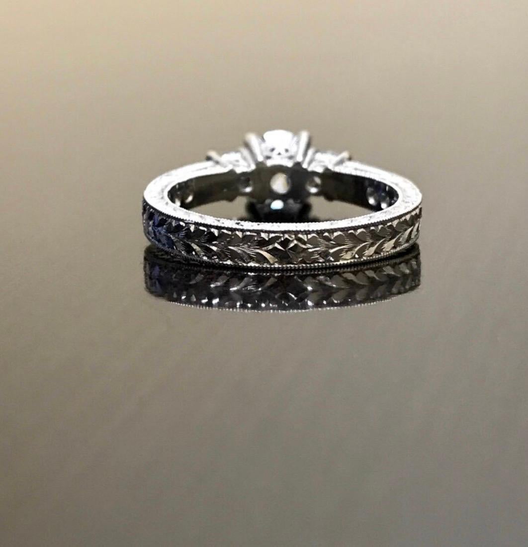 Art Deco Platinum Round D Color 0.73 Carat Three Stone Diamond Engagement Ring For Sale 3