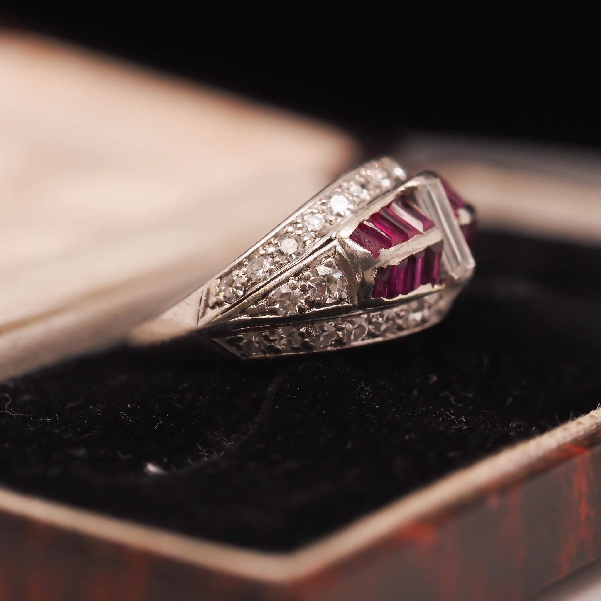 Year: 1930s
Item Details:
Ring Size: 4.75 (Sizable)
Metal Type: Platinum [Hallmarked, and Tested]
Weight: 4.6 grams
Diamond Details: .75ct total weight. Antique straight baguette and antique single cuts. G Color, VS/SI Clarity
Side Stone Details: