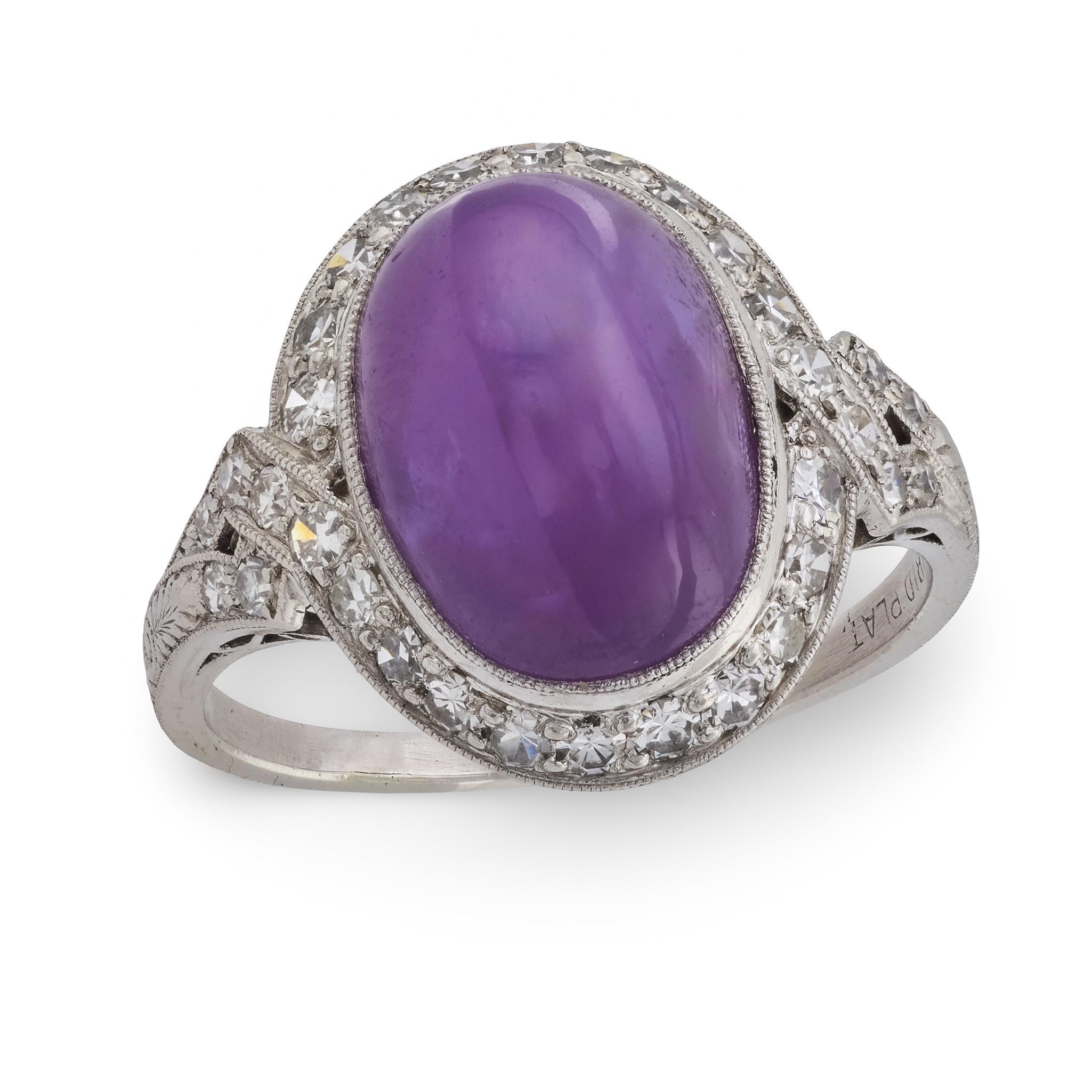 Anello aureola in platino Art Deco con rubino e diamanti