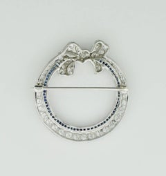 Art Deco Platinum Sapphire and Diamond Circle Brooch, circa 1920s