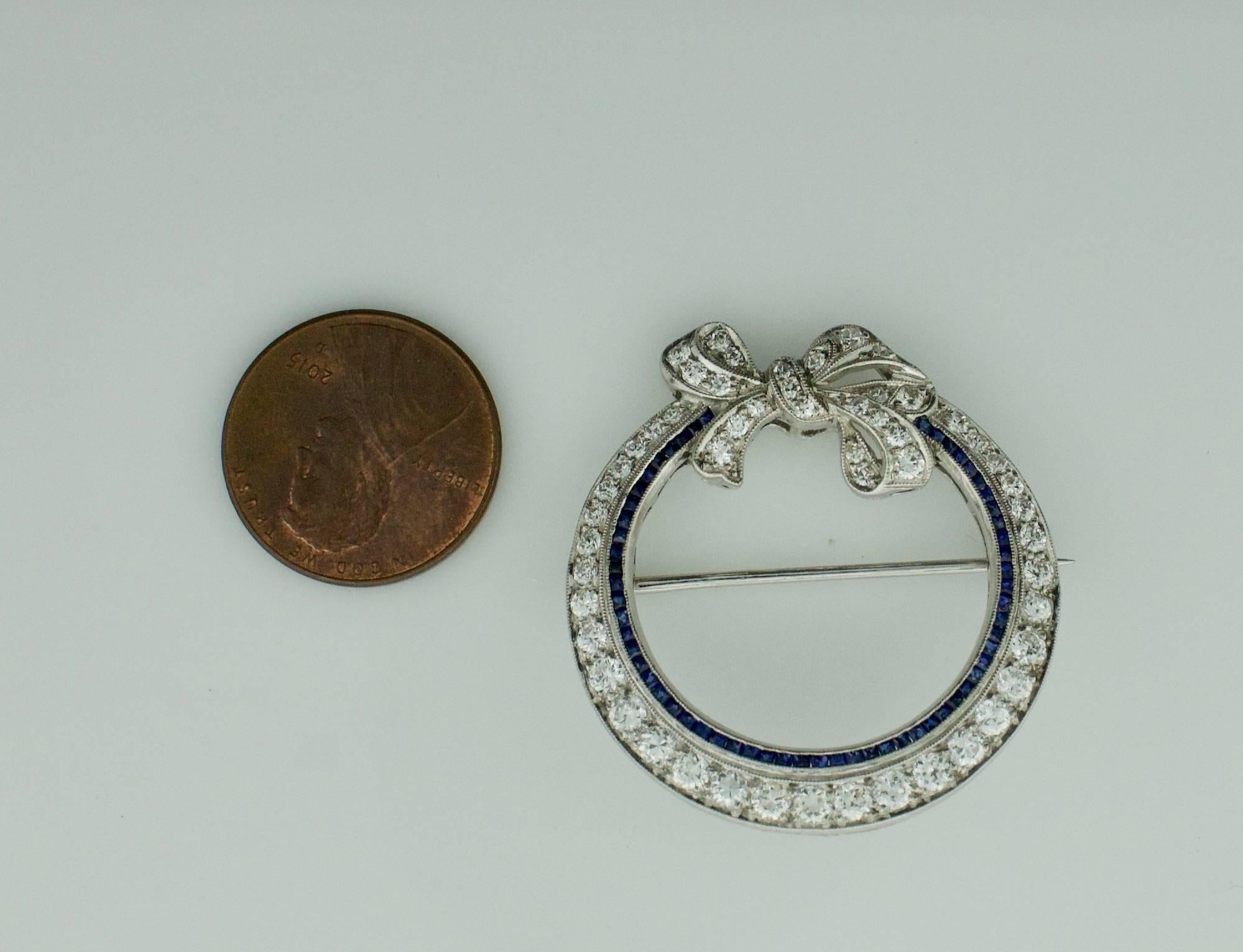 Art Deco Platinum Sapphire and Diamond Circle Brooch, circa 1920s In Excellent Condition In Wailea, HI