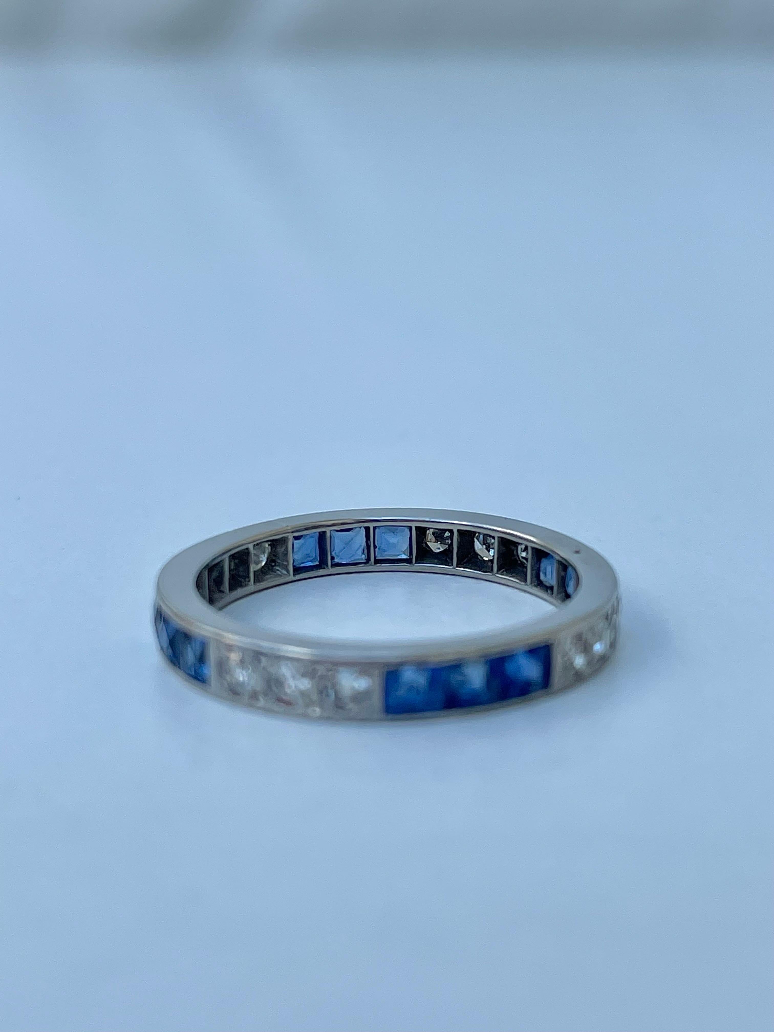 Art Deco Platinum Sapphire and Diamond Full Eternity Band Ring 

delightful sapphire and diamond stone ring, truly sparkles 

The item comes without the box in the photos but will be presented in a gift box

Measurements: weight 2.63g, size UK M1/2,