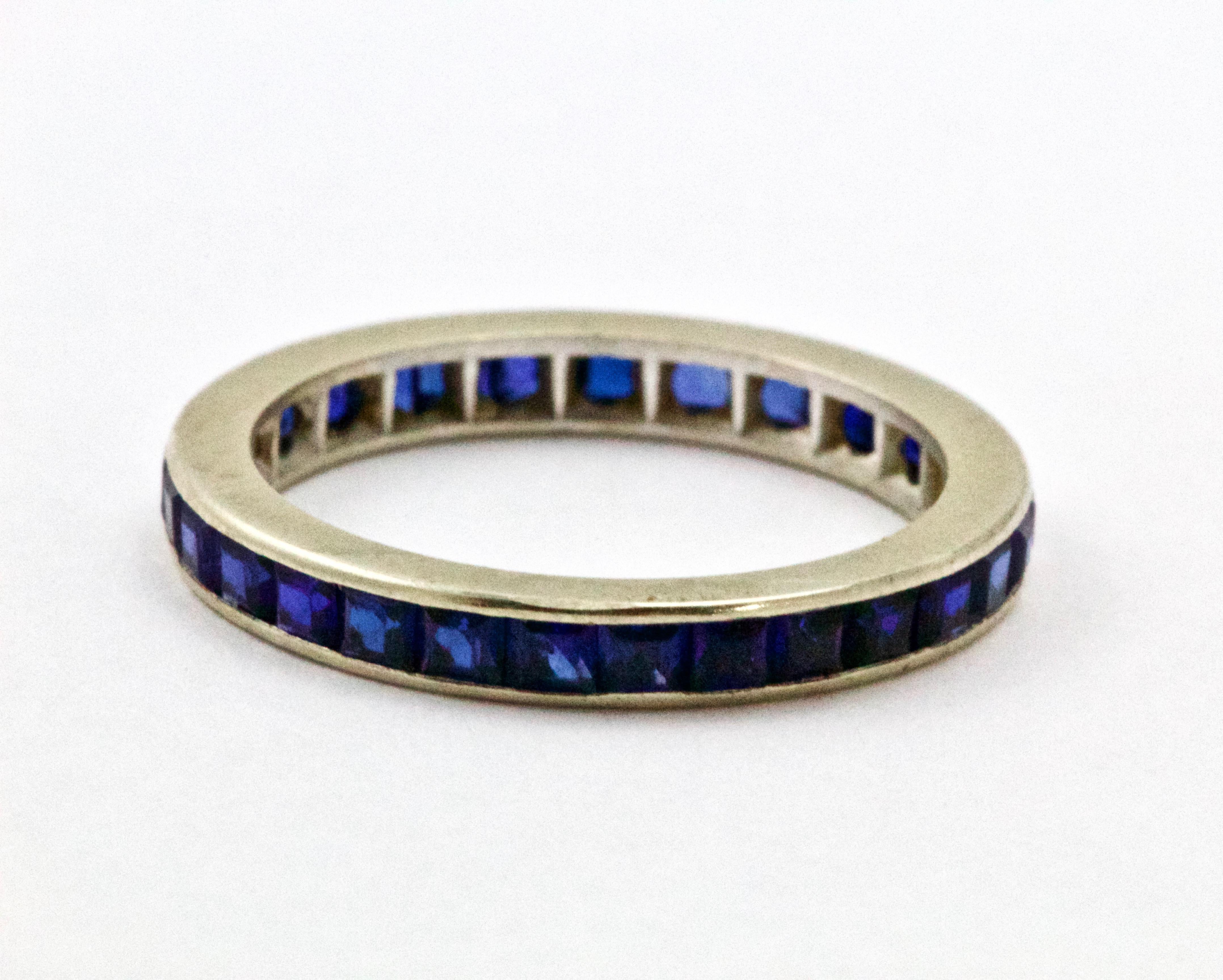 Stunning Art Deco sapphire eternity ring. set with approx 1.5 carats of princess cut natural sapphires channel set. 
Ring Size : 5 or J 1/2
Weight : 1.6 grams 