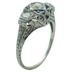 Art Deco Platinum Three Stone Diamond and Synthetic Sapphire Filigree Ring 
