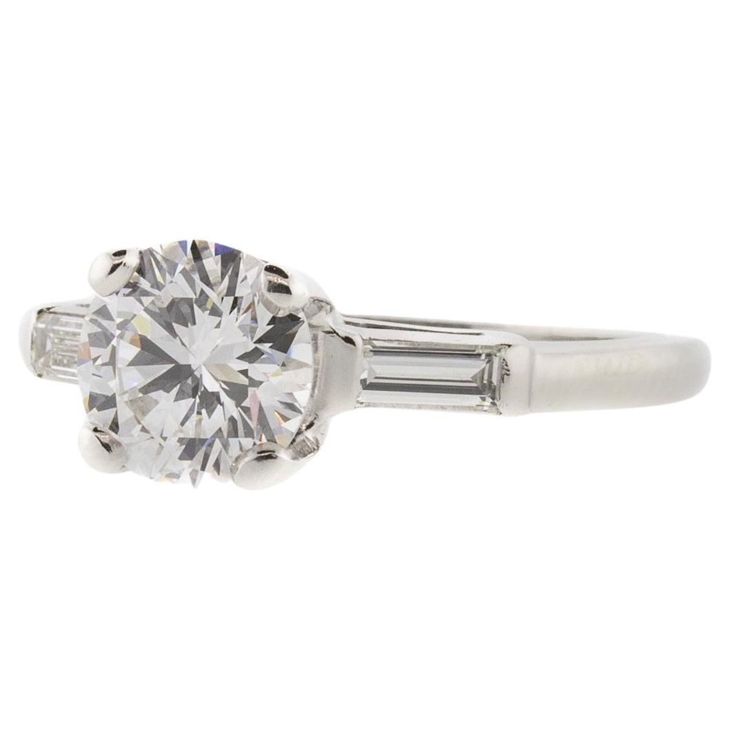 Art Deco Platinum Three Stone Round Brilliant & Baguette Diamond Ring For Sale