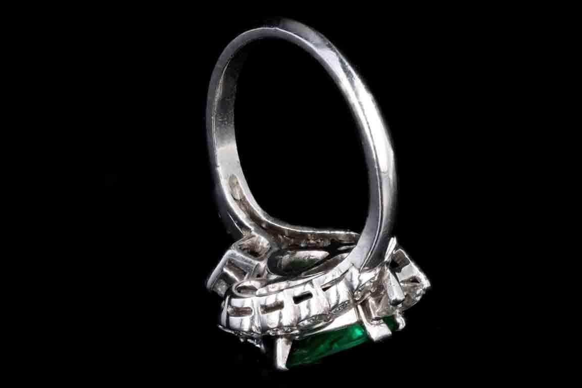 Women's Art Deco Platinum Triangular Cut Colombian Emerald & Half Moon Cut Diamond Ring