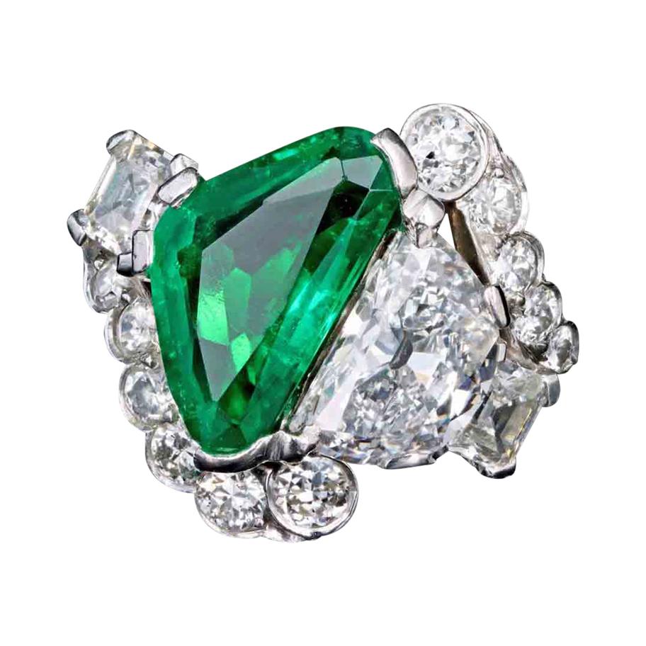 Art Deco Platinum Triangular Cut Colombian Emerald & Half Moon Cut Diamond Ring