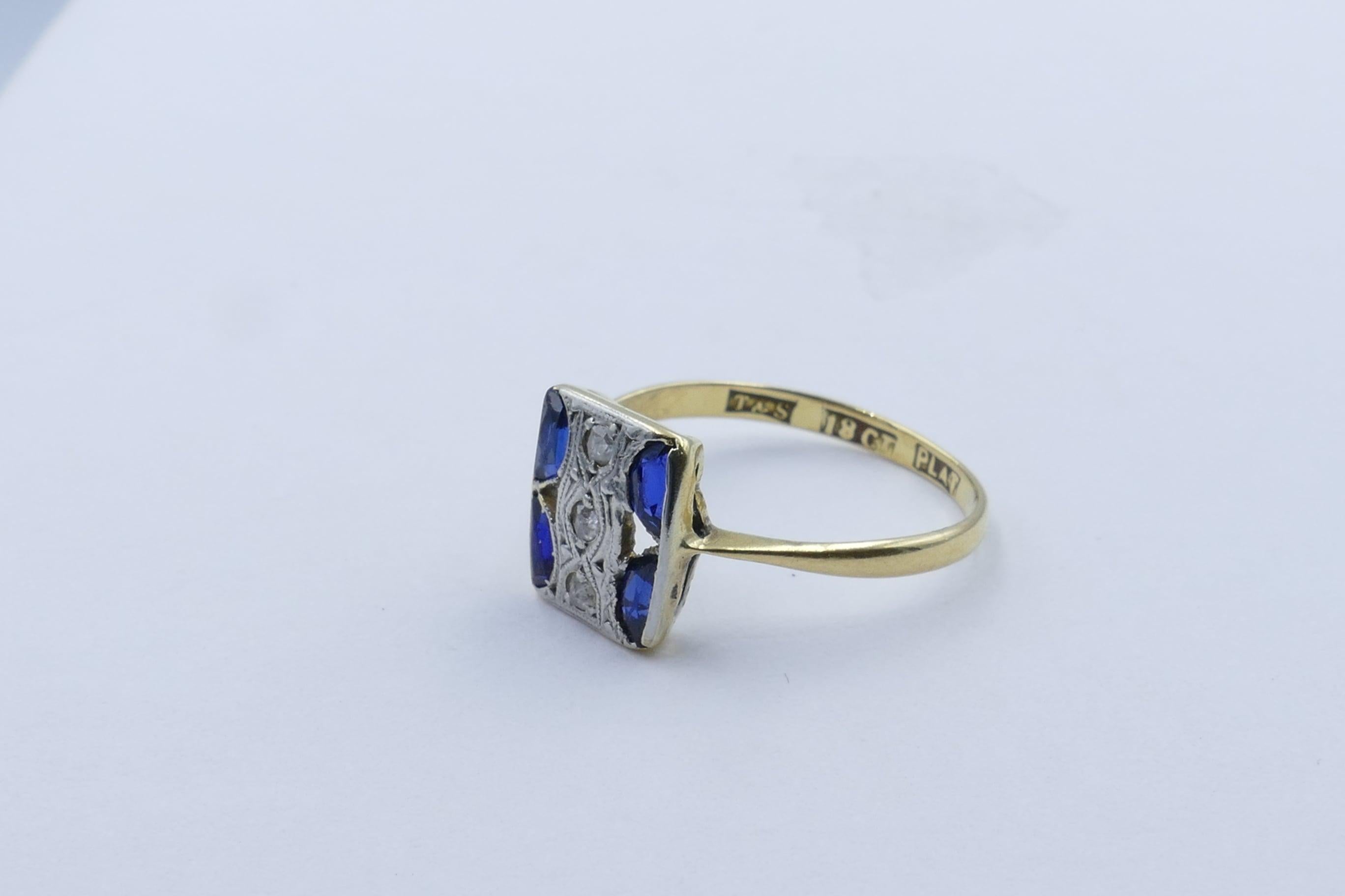 Hand made genuine Art Deco 18ct Yellow Gold & Platinum Diamond Ring embellished with deep blue old Sapphires.
It features 3 3 Old Round Cut Diamonds, approximately 0.06cts in combined weightH/I Colour, P1 Clarity.
As well there are  4 Half Moon Cut