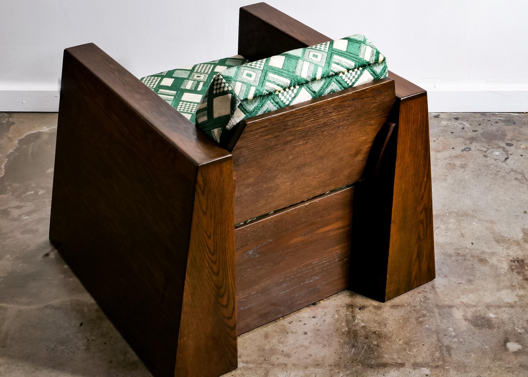 Fascinating hand-crafted plywood chair in the Usonian style. Reminiscent of Frank Lloyd Wright or even some French art deco designs, it was made by an unknown Oregon woodworker circa 1960s. With skill, the chair is executed in dark stained Douglas