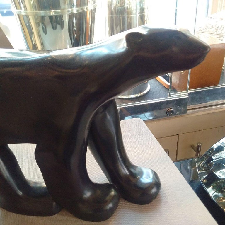 François Pompon: ‘Ours Blanc’ (Polar Bear), a fine Art Deco bronze sculpture with dark brown patina of a striking polar bear. This sculpture was first exhibited at the 1922 Salon d’Autonne in Paris, this example cast posthumously (circa 1960s).