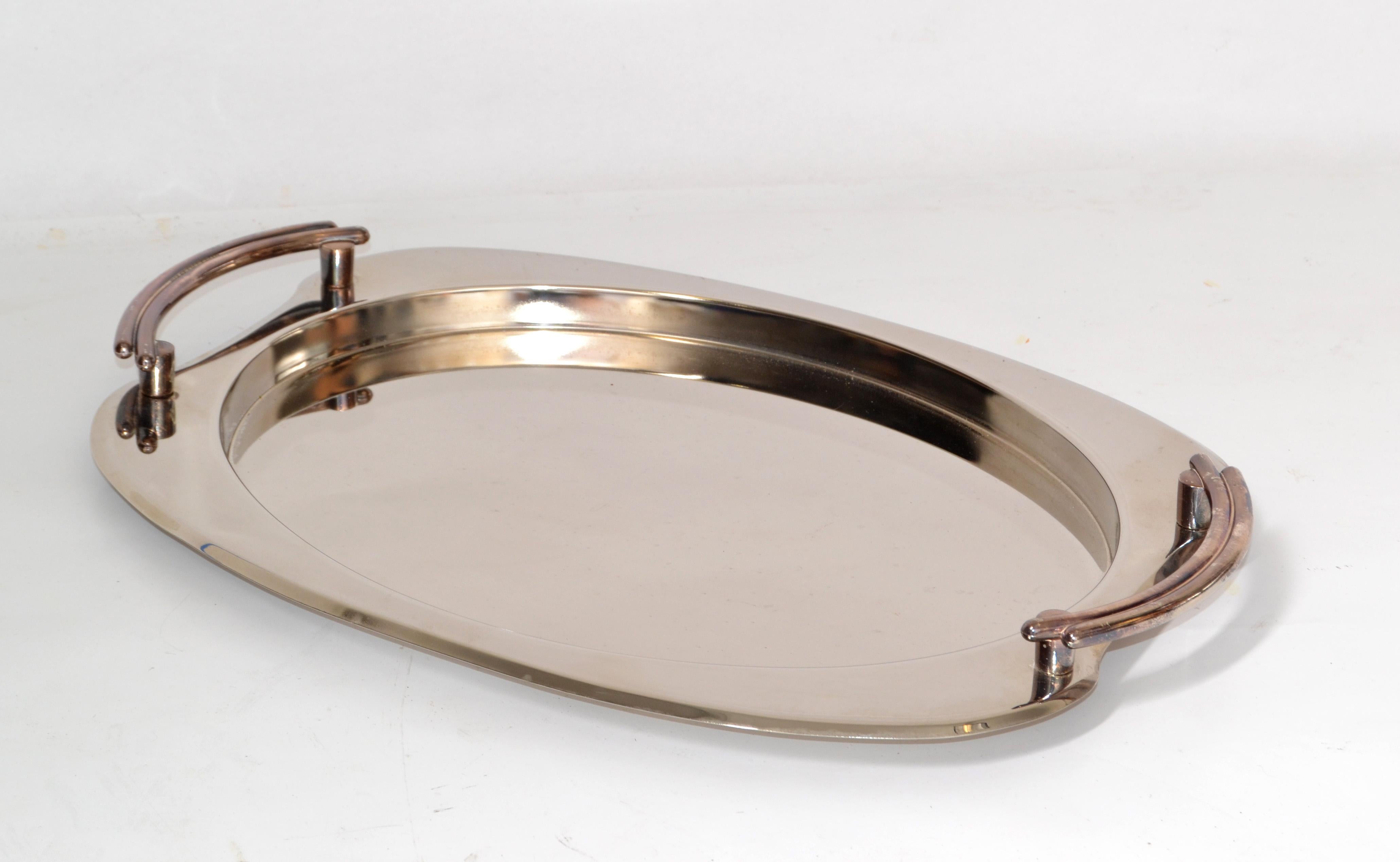 Italian Art Deco Polished Steel Platter, Serveware, Barware or Tray with Silver Handles.
Great also for Your Vanity to display the perfume bottles. 
In very good condition with some Tarnish to the Silver.
Just recently professionally polished. 