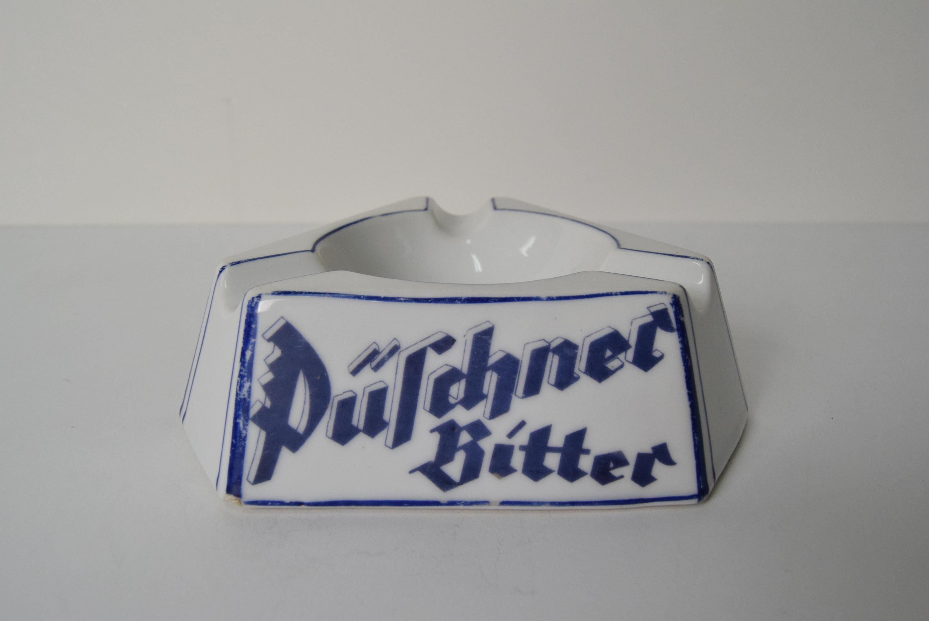 Inizio XX secolo Posacenere pubblicitario in porcellana Art Deco Püschner Bitter, anni '20. in vendita