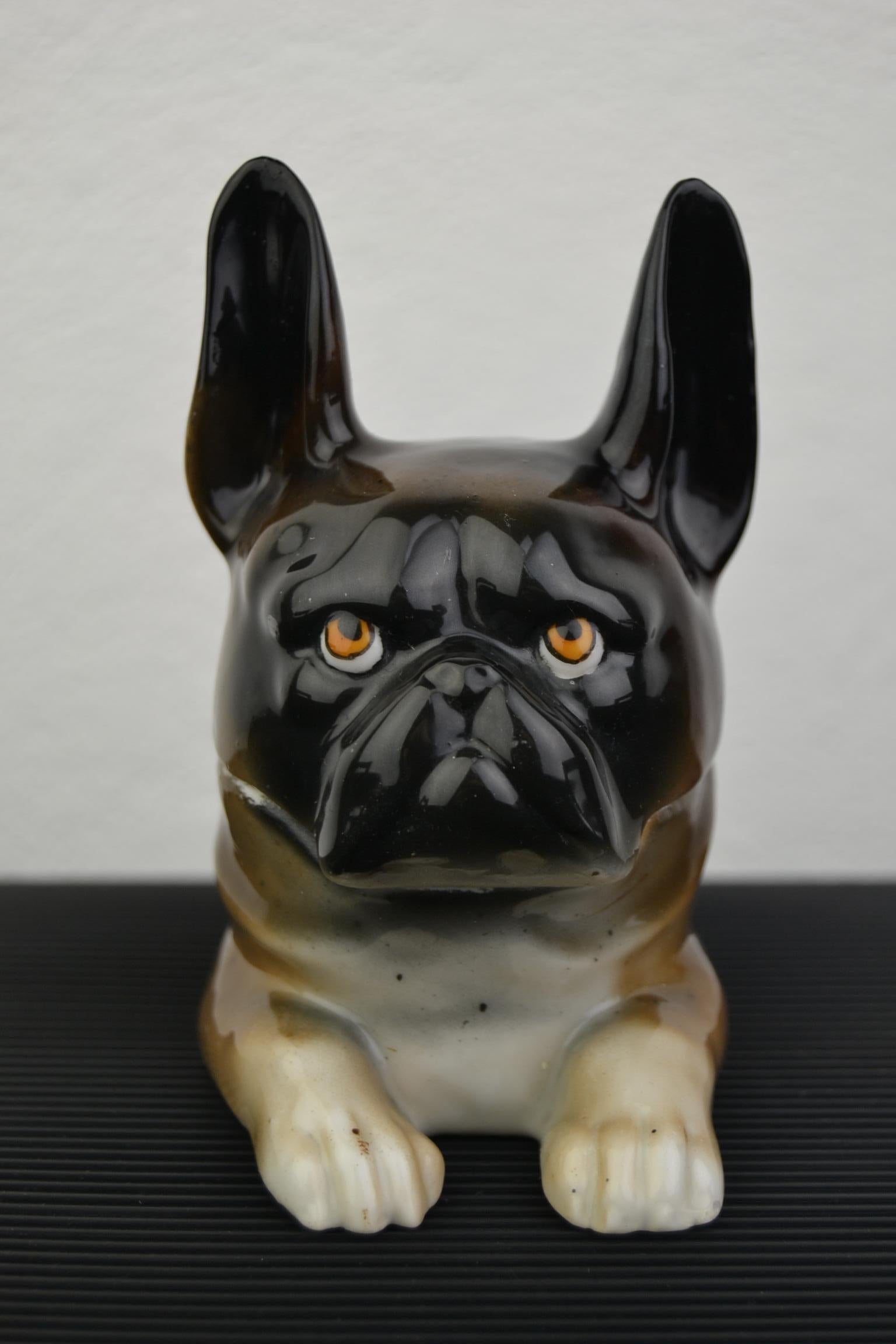 Who will place this cutie on his desk?
A porcelain French bulldog inkwell - Frenchie Statue.
This animal Inkwell - Dog inkwell is a brown with black dog, big tri- colored eyes and wo long black ears.
This black masked dog figurine - animal statue