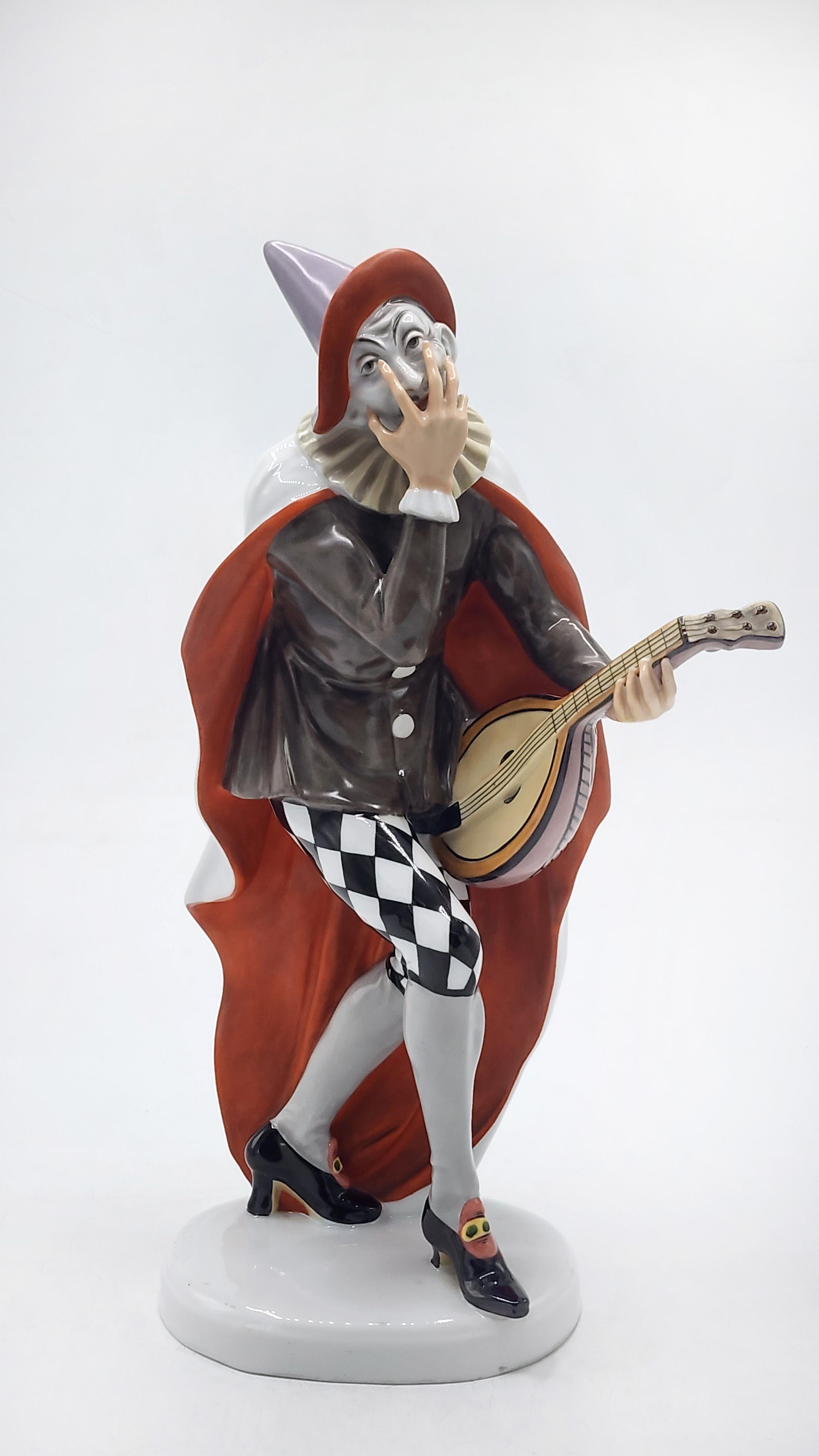 Art Deco Porcelain Figurine c. 1920, Bajazzo, Rosenthal, by Himmelstoss
This is an Art Deco porcelain figurine, Bajazzo model, by Rosenthal, designed by Himmelstoss around 1920. The piece represents a character from the Commedia dell'arte, holding a