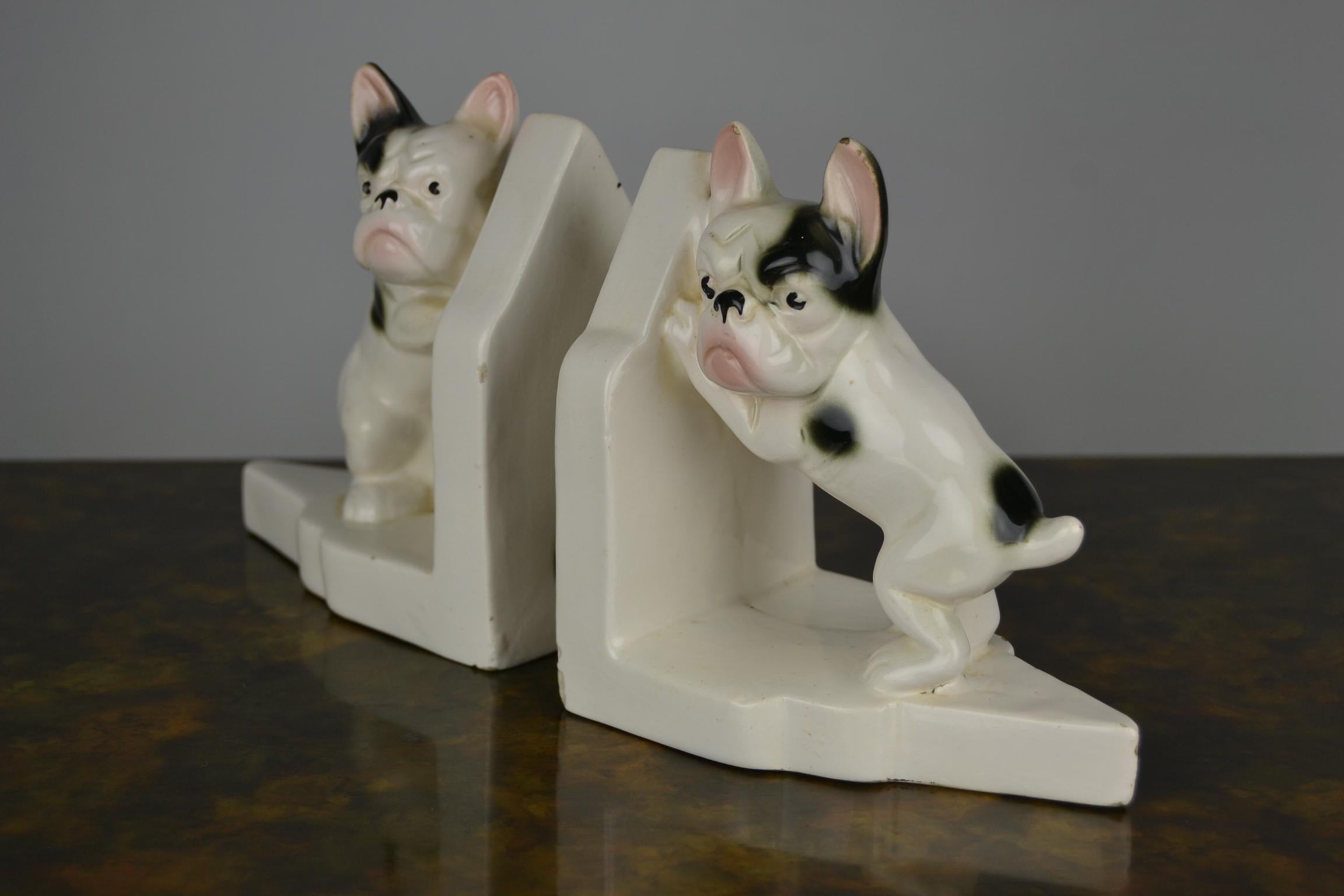 German Art Deco French Bulldog bookends - Frenchie bookends from 1930-1940.
This black and white Bully Dogs do have traces of age and use, so view all pictures well, 
but they are so adorable and cute. 



                      