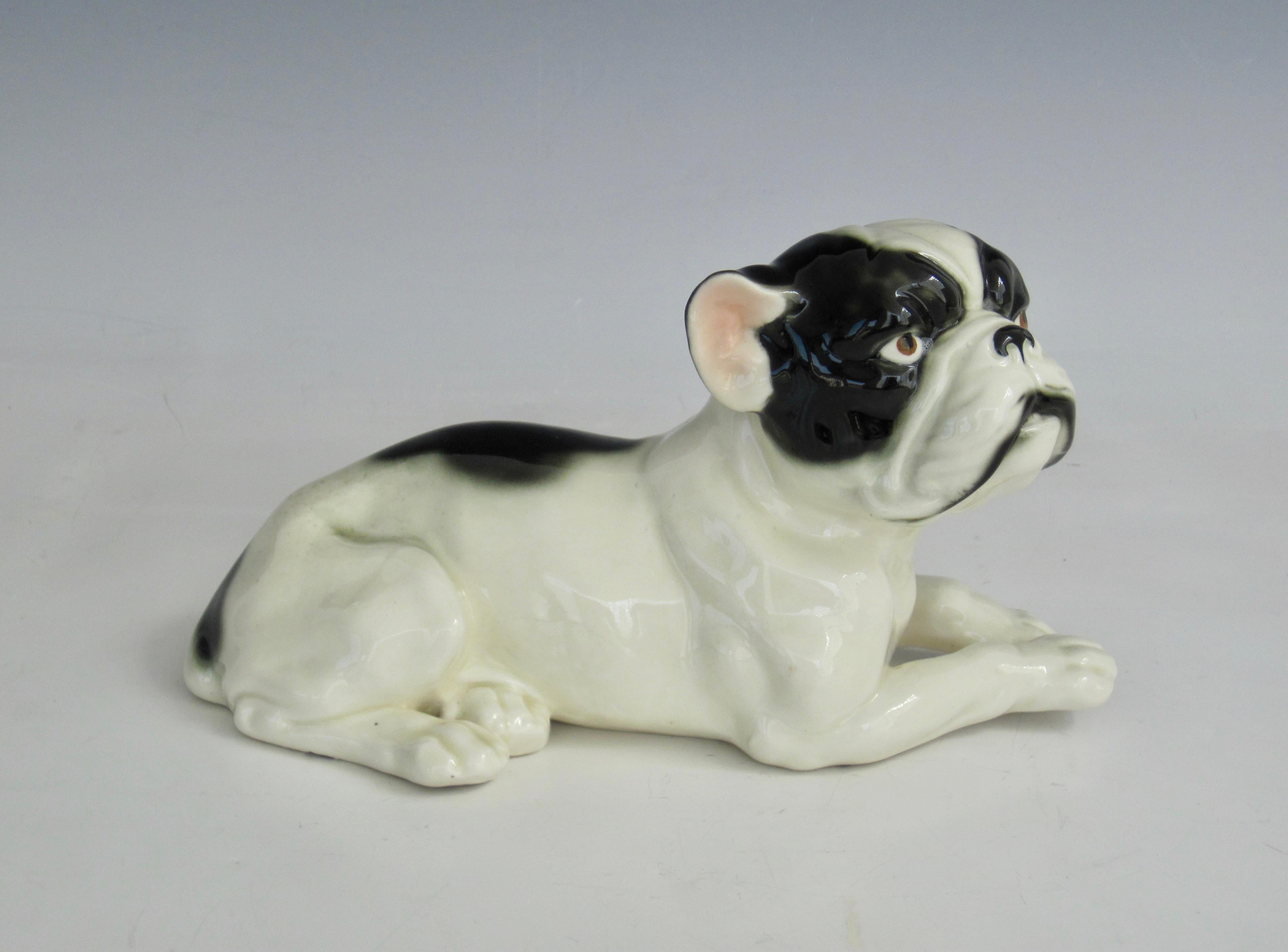 Black and white porcelain French Bulldog sculpture from the Art Deco period. This Frenchie was finely crafted and has loads of charm and details and a good size for decor. Numbered on the underside. No makers mark. Good condition without chips or