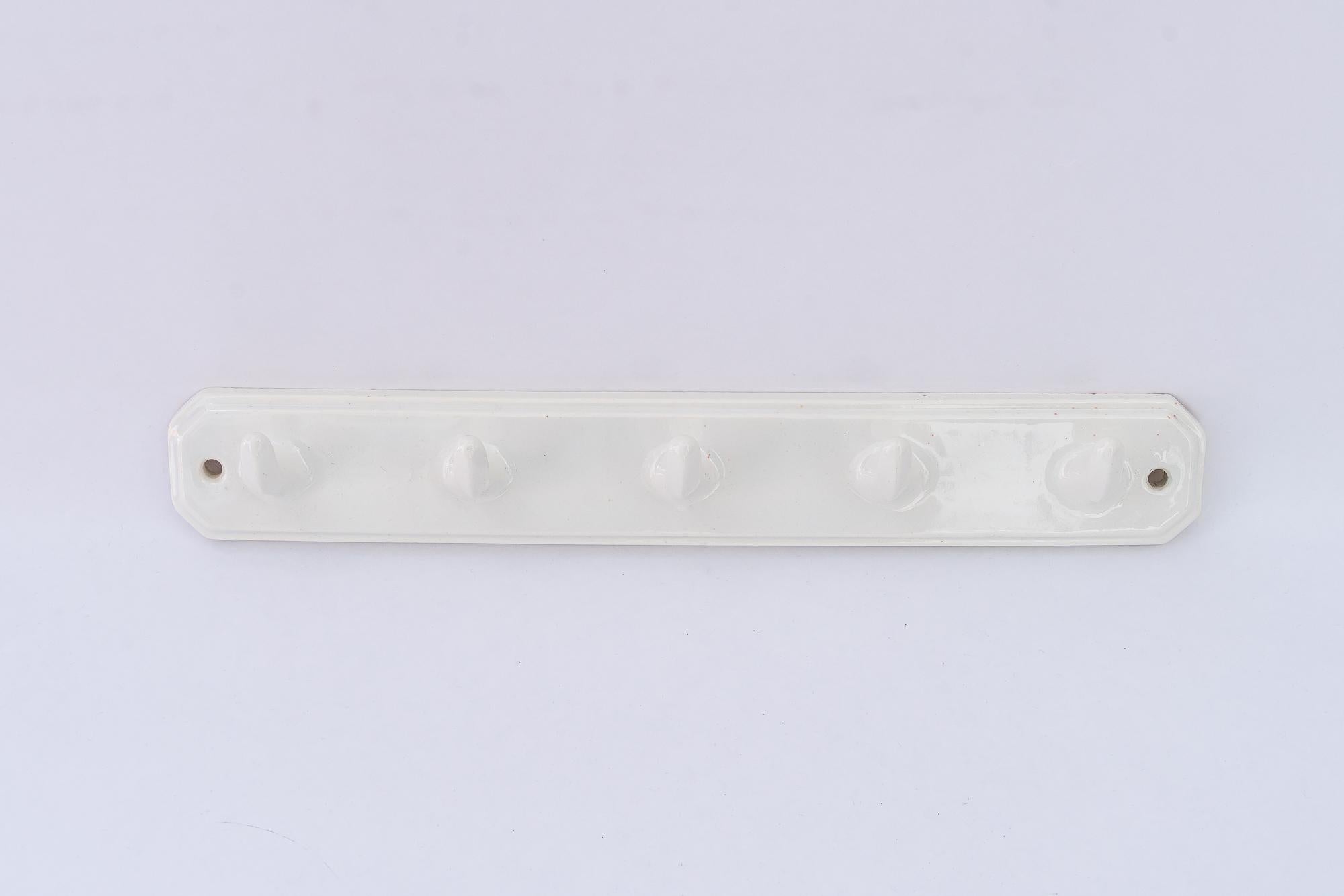 Planche de cuisine en porcelaine Art Déco vers 1920
Etat original