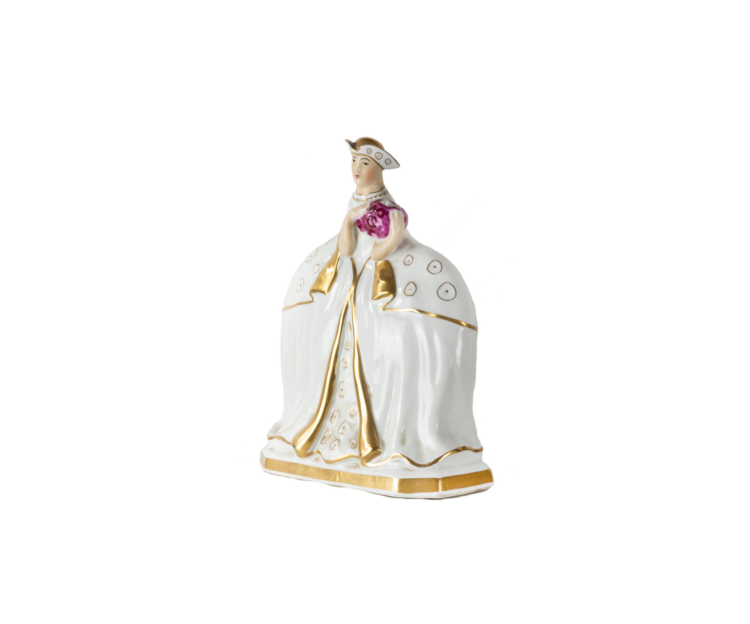 This rare and collectible Art Deco porcelain lamp base, known as the “Espagnole” model, was created by the prestigious French atelier Robj in the 1920s. The piece depicts a noble Spanish lady adorned with a detailed floral headdress, elegant white