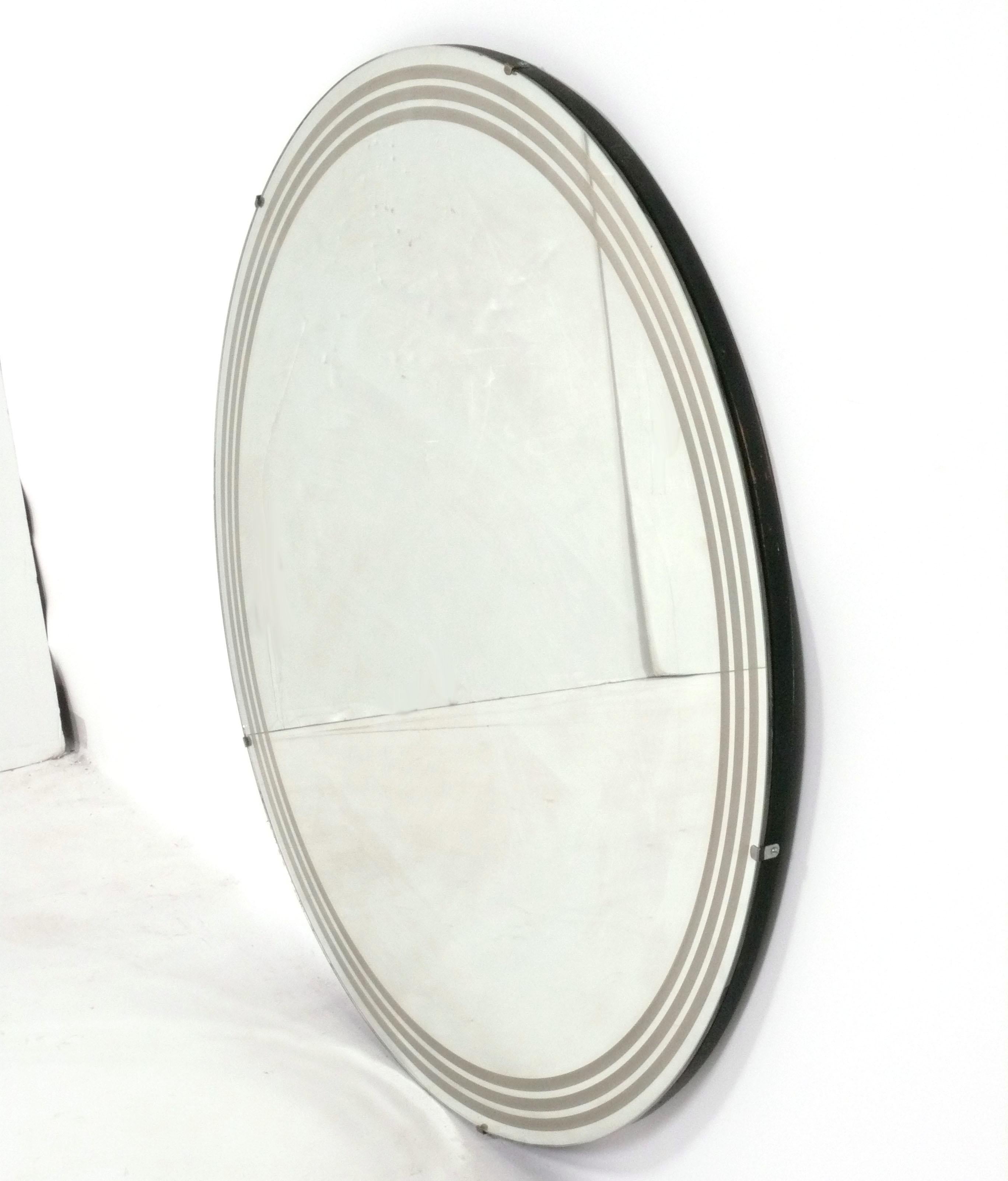 Miroir à hublot Art déco, américain, vers les années 1930. Conserve la chaude patine d'origine. 