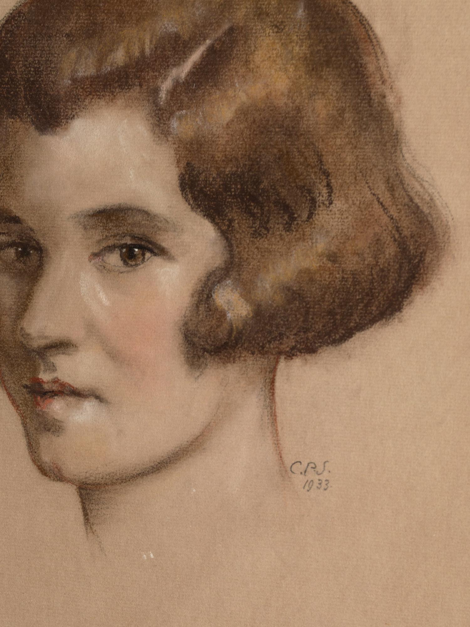 Portrait Art déco d'une jeune femme. Angleterre, 1933.
Dessin au crayon et à la craie, bien exécuté.
Paraphe 